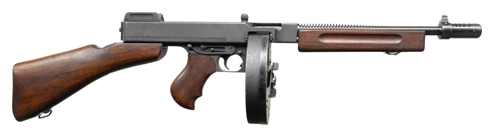 FULLY TRANSFERABLE THOMPSON 1928A1 SUBMACHINE GUN.: Cal. 45 ACP. S# A022714. Bbl. 10 1/2" finned with Cutts Compensator. Blade front sight. Lyman ladder aperture rear sight. Upper & lower assemblies have matching numbers. Fine example of a Bridgeport 1