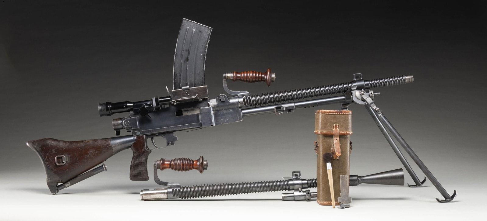 FULLY TRANSFERABLE & EARLY NAGOYA TYPE 99 MACHINE: GUN.Cal. 7.7 Jap. S# 1612. Bbl. 21 3/4" matching & dated July 1941. No flash hider installed. Grooved blade front sight with protective ears. Rear sight aperture is separate but present. Receiver moun