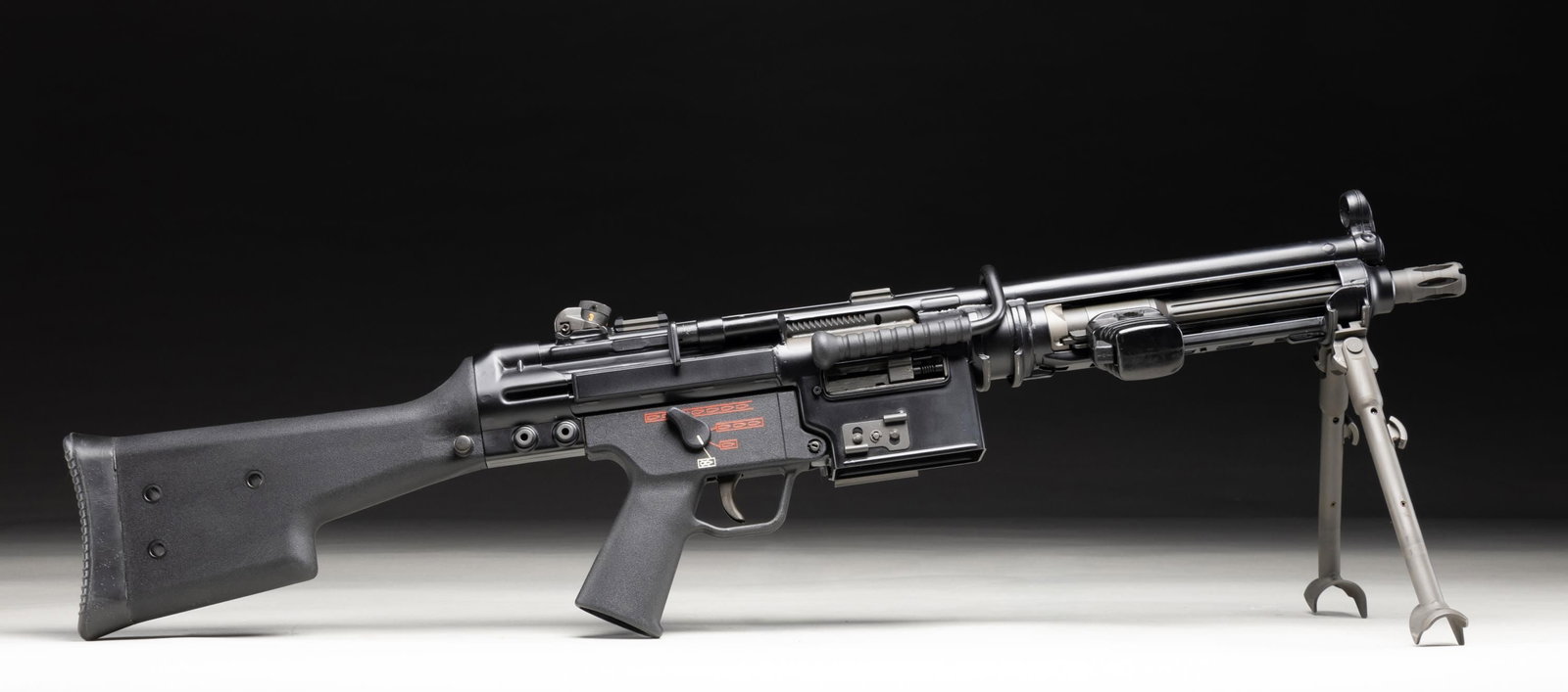 FULLY TRANSFERABLE H&K/FLEMING HK21K MACHINE GUN.: Cal. 308 S# H1934 (Sear) & A015977 (Gun). Bbl. 11" quick detach with flash hider. Standard H&K sights. Shortened H&K-21 belt-fed machine gun built with a registered Fleming sear & H&K parts. Receiver