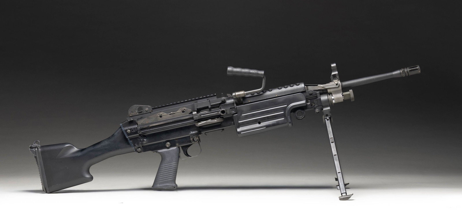 EXCELLENT CONDITION, RARE & DESIRABLE: ORIGINAL, DUAL FEED FN MINIMI MACHINE GUN. PRE-86 DEALER SAMPLE (KEEPER). Cal.5.56 NATO. S# FN008958. Bbl. 20" over brake. A rare opportunity to own a functional piece of modern day U.S. Military
