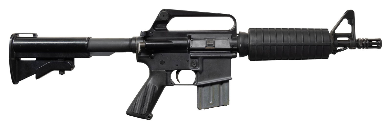 FULLY TRANSFERABLE COLT M16A1 SELECT FIRE CARBINE.: Cal. 5.56mm. S# 9277681. Bbl. 10". Threaded barrel terminated w/ A1 flash hider. Protected post front sight / gas block / bayonet lug. Short "fat" carbine A2 round forend retained w/ tapered delta rin