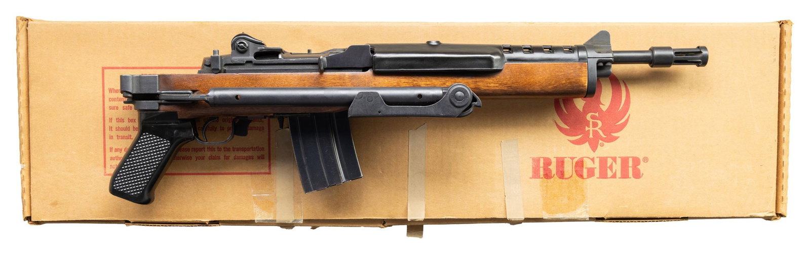 NEAR FINE RUGER AC-556K MACHINE GUN WITH MATCHING: FACTORY BOX. Cal. 223. S# 191-12654. Bbl. 13". AC-556K machine gun mfg. by Ruger in 1984. Top rear of the receiver is marked "RUGER/ AC0556/ CAL. .223", with Ruger's mfg. information marked on the lef