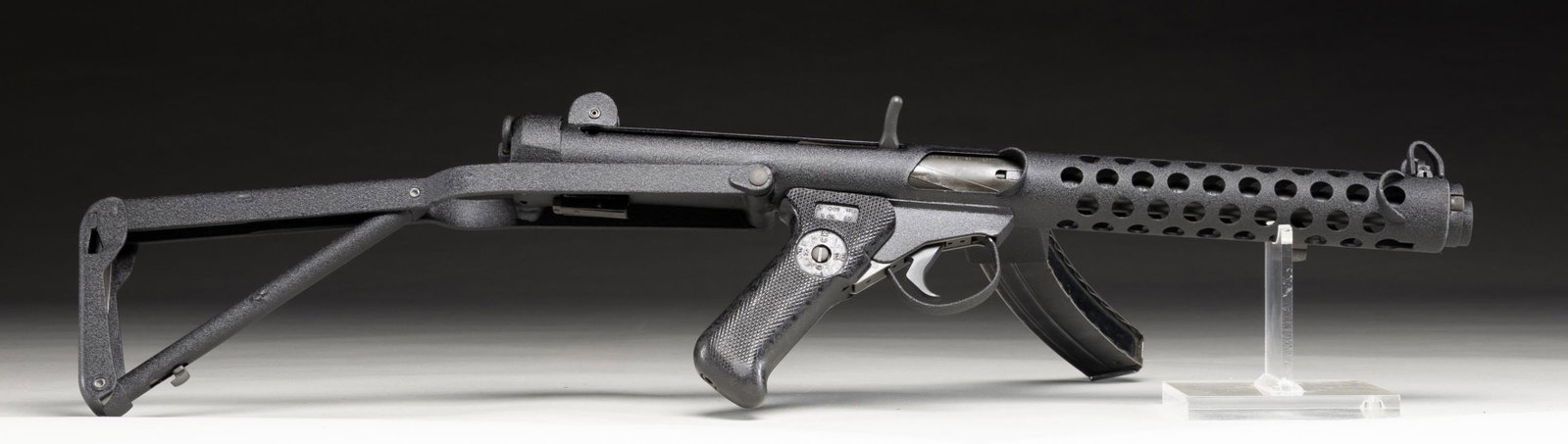 RICHARD URICH REGISTERED STEN TUBE STERLING MK IV: CONVERSION SUBMACHINE GUN. Cal. 9mm (9x19mm). S# 0023. Bbl. 8". Sten tube registered by Richard Urich and converted into a Sterling Mk IV (L2A3) configuration. The left side of the receiver tube is