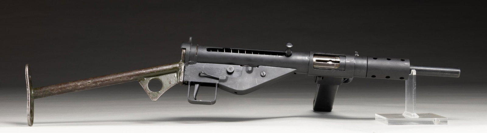 TAYLOR MANUFACTURING STEN MK II SUBMACHINE GUN.: Cal. 9mm (9x19mm). S# BT20. Bbl. 7 3/4". Sten Mk II submachine gun mfg. by Taylor Manufacturing on a new tube and original parts / components. Top rear of the receiver tube is marked with the S#