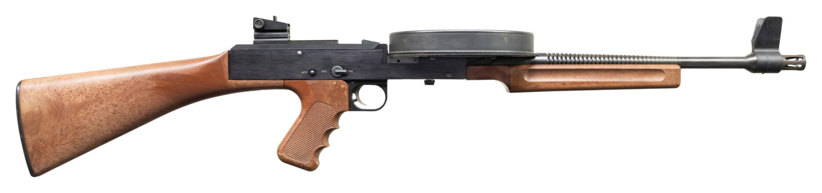 FULLY TRANSFERABLE AMERICAN 180 M2 MACHINE GUN.: Cal. 22 LR. S# B05060. Bbl. 16 3/4" finned. Blade front sight with protective ears. Adjustable aperture rear sight. Open bolt full auto MG known for their high rate of fire & chambered in the most aff
