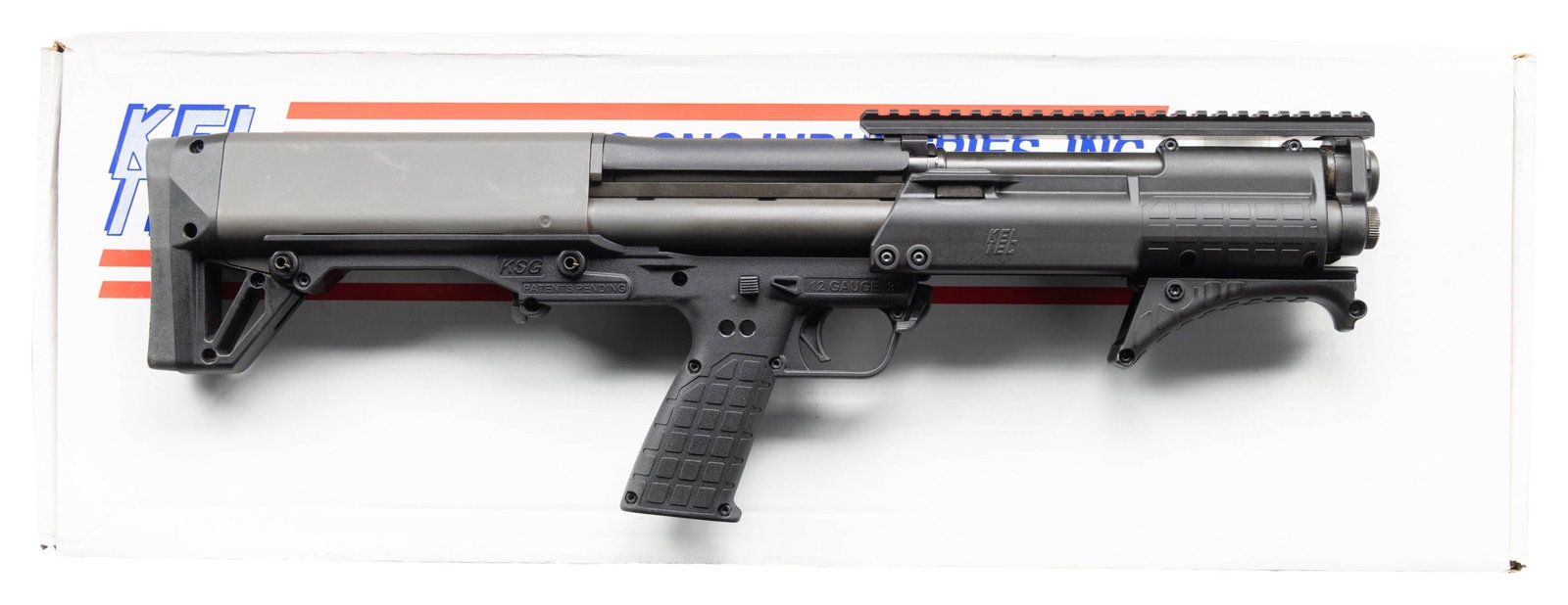 KEL TEC PATROL SHORT BARREL PUMP ACTION SHOTGUN.: Cal. 12 Ga. 3". S# X3F16. Bbl. 13 3/4". Top mounted picatinny rail for sight mounting. Unique bullpup short barreled shotgun made by Kel-Tec with dual mag tubes for total of 10 rd. capacity with 2 3/4
