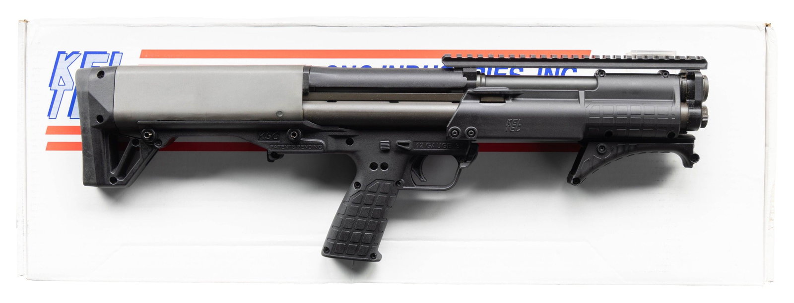KEL TEC PATROL SHORT BARREL PUMP ACTION SHOTGUN.: Cal. 12 Ga. 3". S# X3F90. Bbl. 13 3/4". Top mounted picatinny rail for sight mounting. Unique bullpup short barreled shotgun made by Kel-Tec with dual mag tubes for total of 10 rd. capacity with 2 3/4