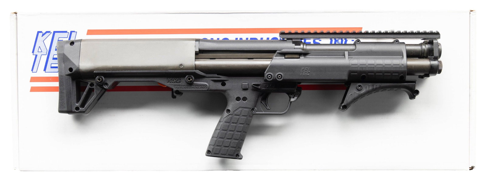 KEL TEC PATROL SHORT BARREL PUMP ACTION SHOTGUN.: Cal. 12 Ga. 3". S# X3F91. Bbl. 13 3/4". Top mounted picatinny rail for sight mounting. Unique bullpup short barreled shotgun made by Kel-Tec with dual mag tubes for total of 10 rd. capacity with 2 3/4