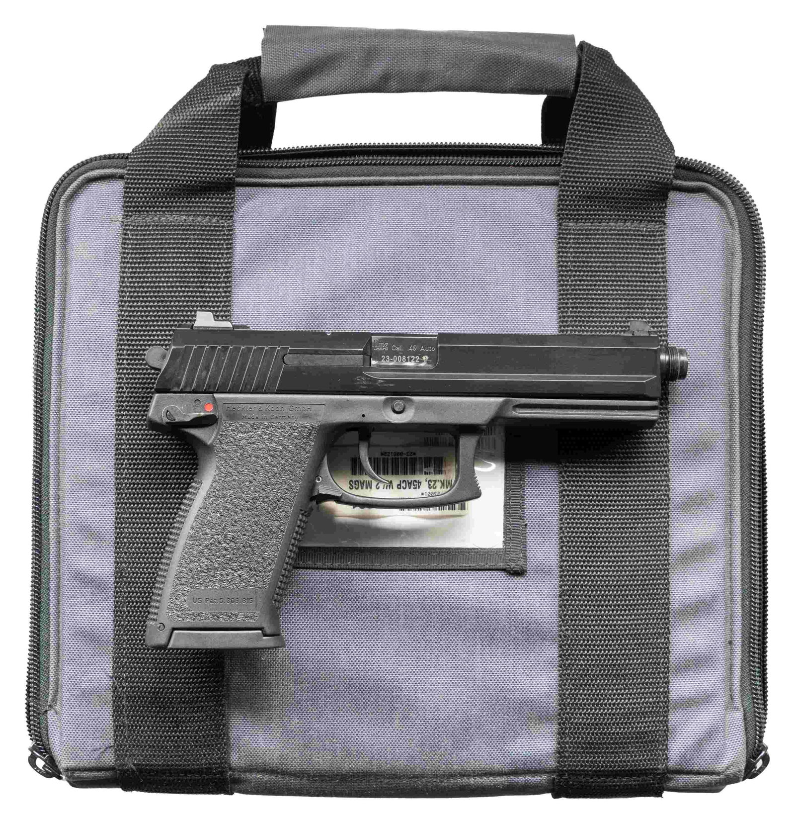HIGHLY DESIRABLE HECKLER & KOCH MARK 23: SEMI-AUTOMATIC PISTOL WITH MATCHING KNIGHTS ARMAMENT OHG SILENCER & EAGLE INDUSTRIES SOFT CASE. Cal. 45 ACP. S# 23-008122 (Both). Bbl. 5 11/16". Mark 23 semi-automatic pistol mfg. in Germany by Heckle