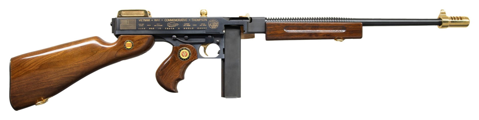 AUTO-ORDNANCE / AMERICAN HISTORICAL FOUNDATION: VIETNAM WAR COMMEMOATIVE SEMI-AUTO 1927-A1 THOMPSON. Cal. 45 ACP. S# V0519. Bbl 18 3/4" over fixed slotted compensator has a ribbed rear section. Compensator with blade sight, base for ladder style re