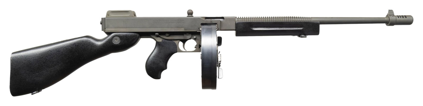 AUTO ORDNANCE 1927A1 THOMPSON SEMI AUTO RIFLE.: Cal. 45 ACP. S# KB2916. Bbl. 16 1/2" with Cutts style comp. Blade front sight. Lyman style ladder aperture rear sight. Modern Kahr Arms semi auto closed bolt Thompson rifle. Parkerized finish. Black s