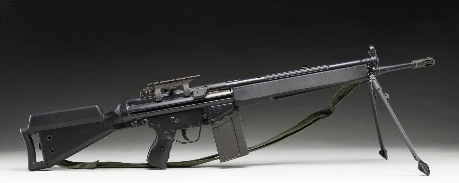 PREBAN H&K 91 SEMI AUTO RIFLE.: Cal. 308 Win. S# A052632. Bbl. 18". Standard H&K sights with drum adjustable rear. Receiver mounted A.R.M.S. scope mount. Left side of mag well has "IB" date code for 1981. Right side of mag well has