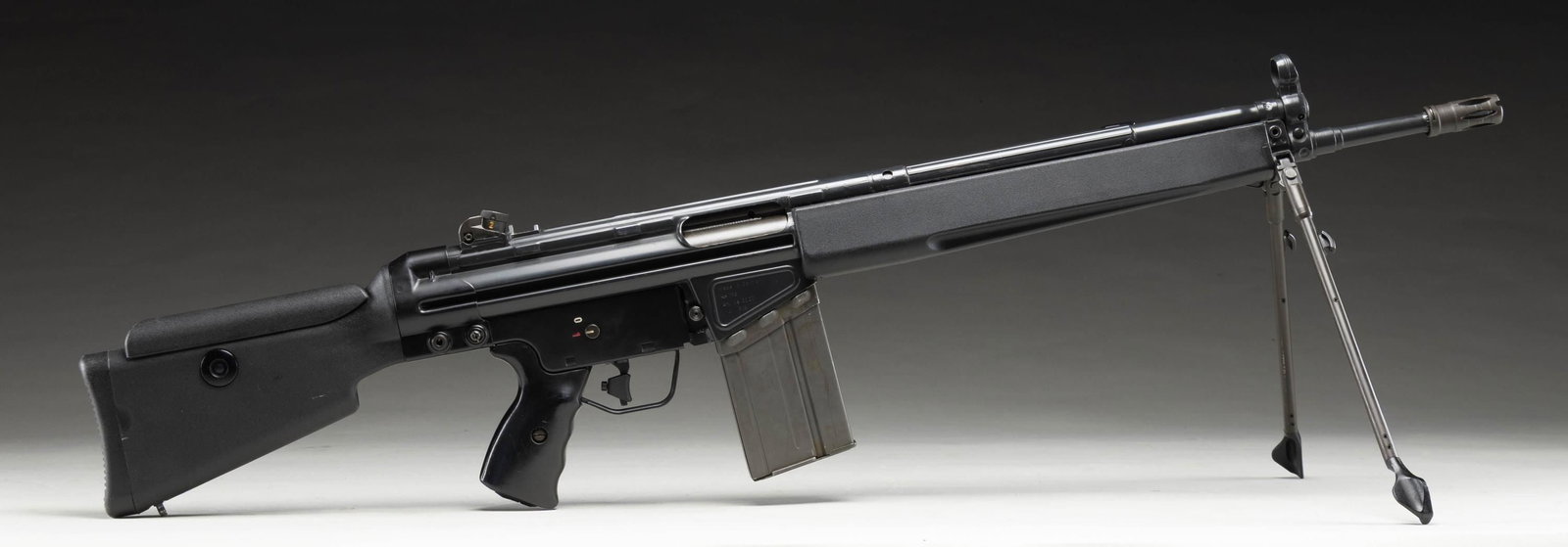 PREBAN H&K 91 SEMI AUTO RIFLE.: Cal. 308 Win. S# A033667. Bbl. 18". Standard H&K sights with drum adjustable rear. Left side of mag well has "IB" date code for 1981. Right side of mag well has H&K markings with Arlington, VA import
