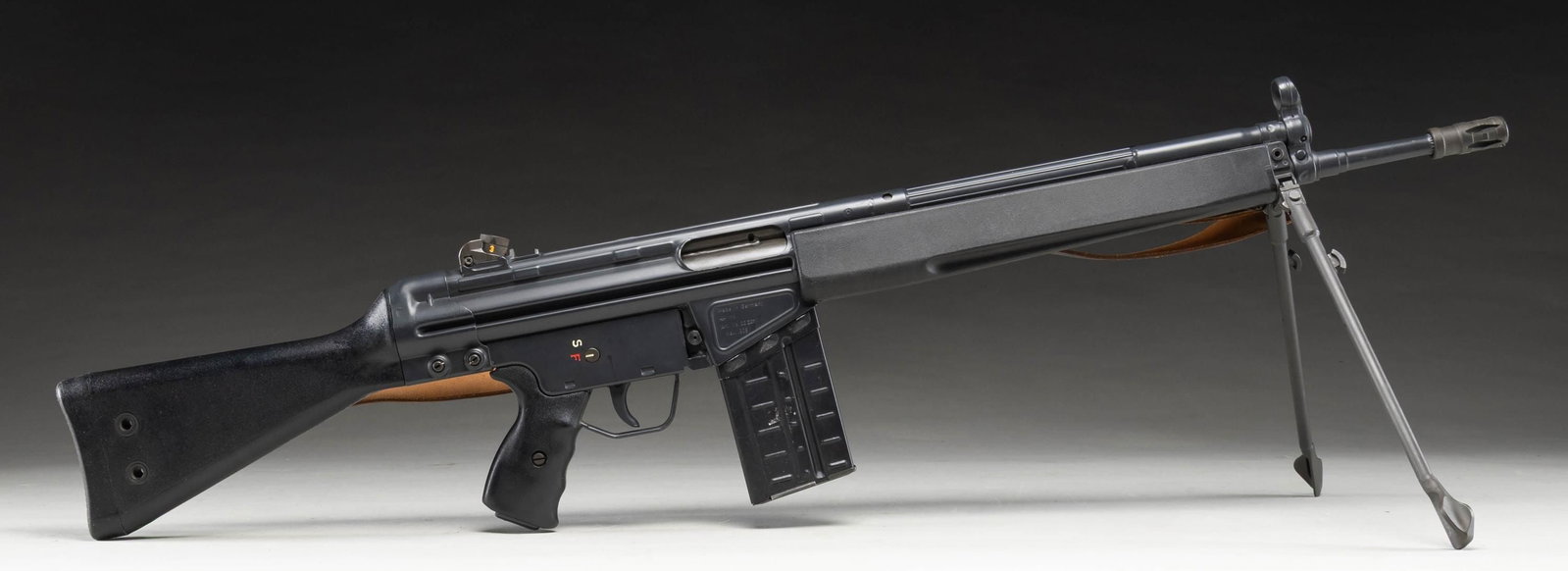 PREBAN H&K 91 SEMI AUTO RIFLE.: Cal. 308 Win. S# A023309. Bbl. 18". Standard H&K sights with drum adjustable rear. Left side of mag well has "IA" date code for 1980. Right side of mag well has H&K markings with Arlington, VA import