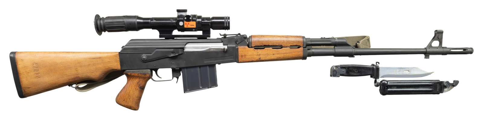 PATTERSON MACHINE M76 SPORTER SEMI AUTO RIFLE.: Cal. 8mm Mauser. S# CM7600023. Bbl. 21 3/4" with flash hider. Post front sight with ears. Tangent rear sight graduated to 1000m. Receiver mounted Zrak M76A scope. Scope has rubber eyepiece, post retic