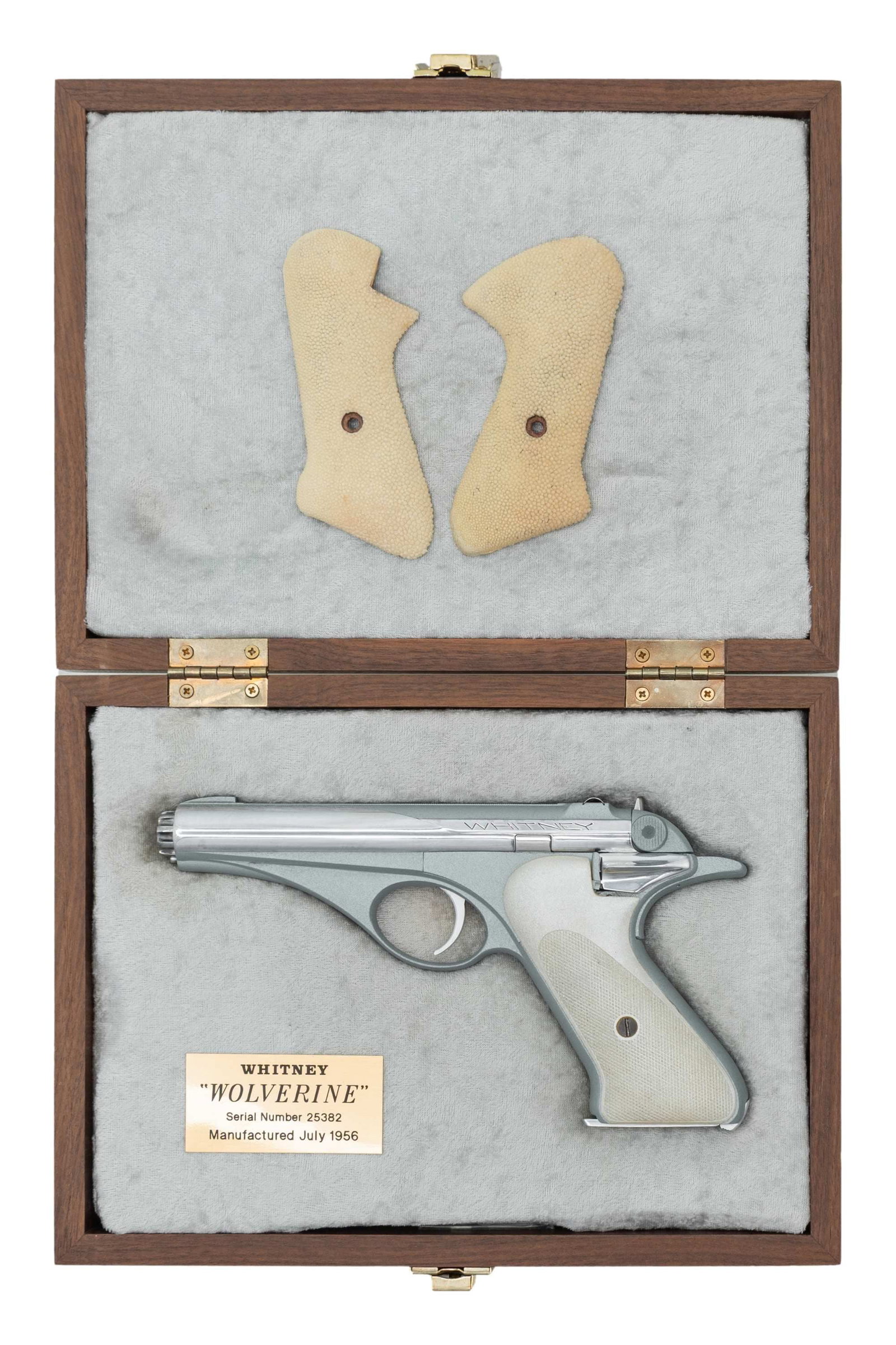 UNIQUE & INTERESTING WHITNEY WOLVERINE SEMI-AUTO: PISTOL. Cal. 22 LR. S# 30442. Bbl. 4 5/8". Designed by Robert Hilberg in 1953, the Wolverine had a brief lifetime and was only manufactured from 1956-1958. Its space age design is very much reminiscen
