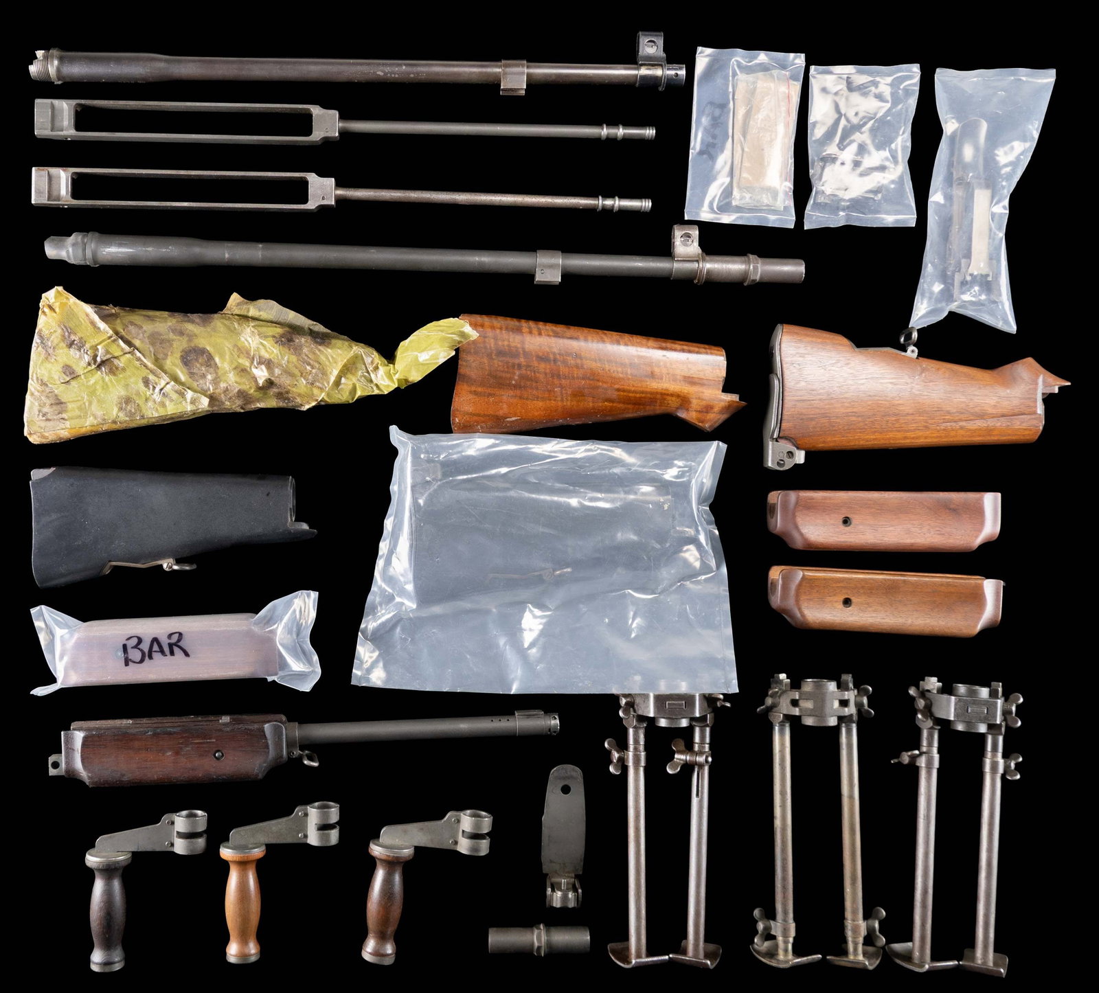 LOT OF MIXED US BAR PARTS.: Parts included a 1) 12-18 dated blued Winchester bbl. with front sight assembly. & very good bore. 2) Three 1918A2 Bipods. 3) Trigger guard assembly. 4) Three hardwood forends. 5) Three carry handles.