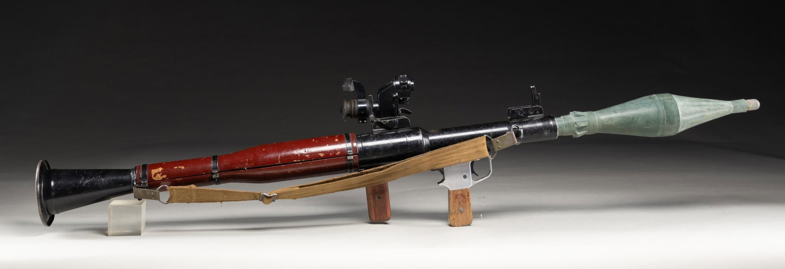DEWATTED BULGARIAN RPG-7B ROCKET PROPELLED: GRENADE LAUNCHER WITH TRAINING PROJECTILE. While originally produced 65 years ago, the RPG has remained one of the most significant anti-tank launchers in the world, largely due to its simplistic desi