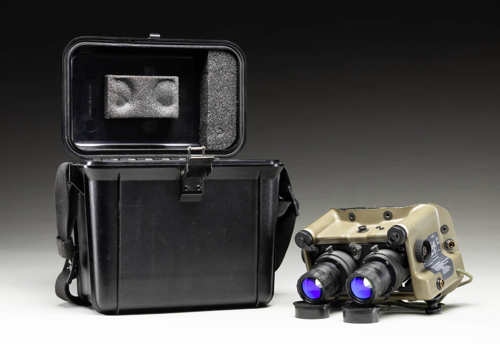 AN/PVS-5A NIGHT VISION GOGGLES.: Gen 2 US military night vision goggles. Unable to test function. Eyepiece covers & black plastic carrying case with strap present. CONDITION: goggles & case show scattered usage wear with some