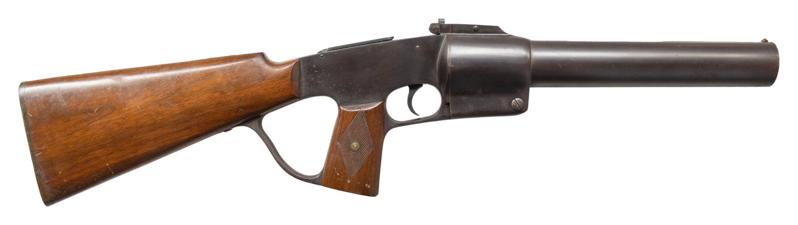 FEDERAL LABORATORIES 37MM GAS GUN.: Cal. 37mm. NSN. Bbl. 24". Brass post front sight. Two aperture rear sights. Black enamel finish. Hardwood stock set with checkered pistol grip panels. CONDITION: stock has scattered handling marks & w