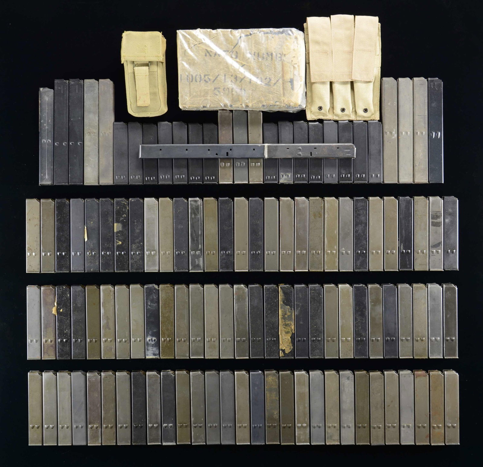 LARGE GROUPING OF UZI MAGAZINES: An assortment of Uzi SMG magazines (138 in total), including the following: 9 steel 40 rd., 113 steel 25 rd., 15 steel 20 rd. & 1 "Franken-mag" constructed of a 32 rd. mag welded above a 50 rd. mag. A