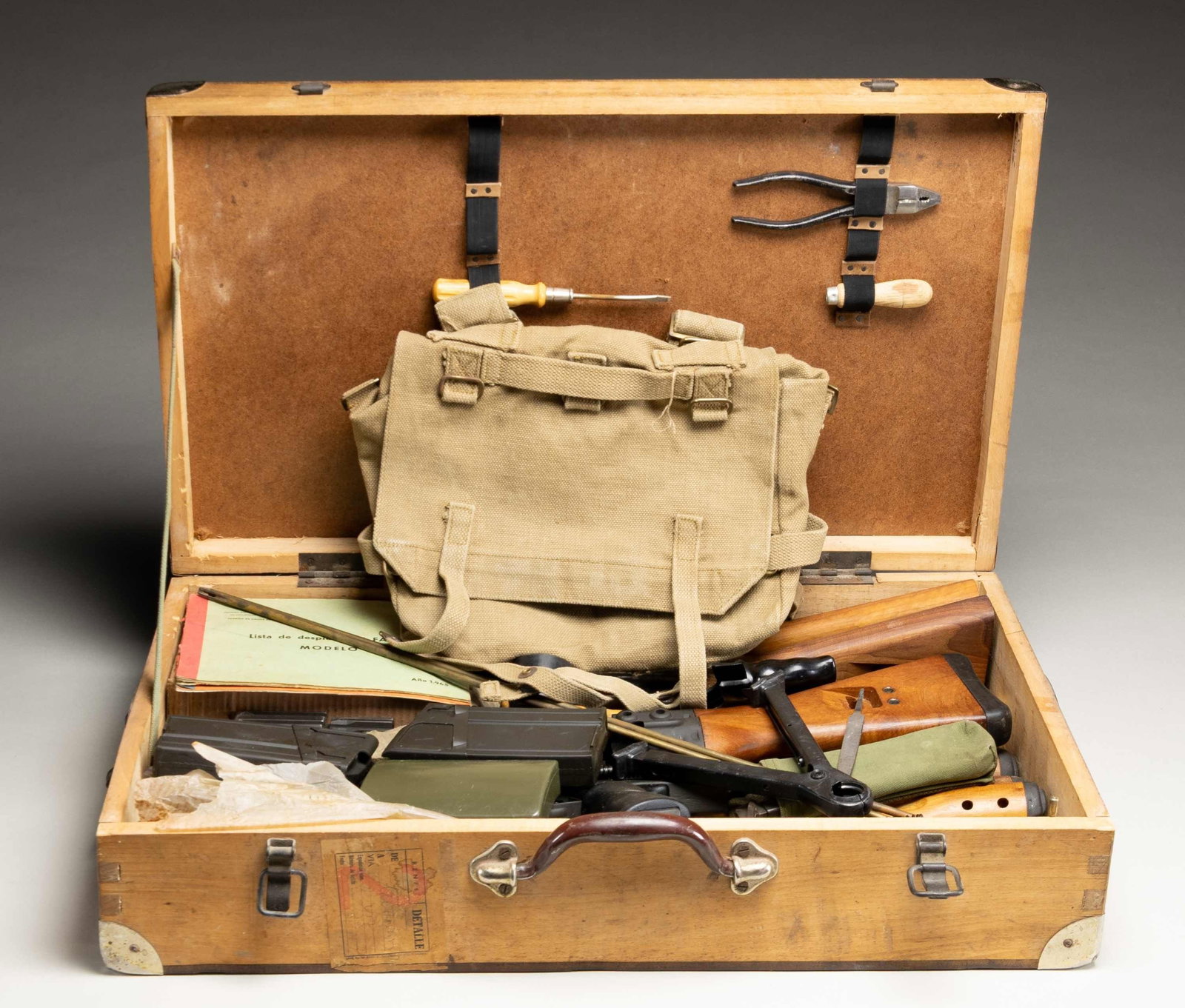 VINTAGE SPANISH CETME ARMORERS KIT.: Vintage Spanish military-surplus wooden suitcase used by field armorers to repair and maintain 7.62x51mm CETME Model C battle rifles. Measures 26.5"x16"x6.5". Contains several small parts & pieces for