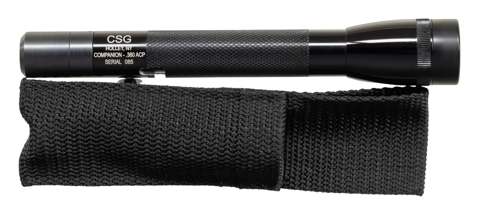 FAUCI CSG COMPANION AOW FLASHLIGHT.: Cal 380 ACP. S# 085. Bbl 1". An interesting concealed 380 within a small 6 1/2 " Maglite style flashlight. UNATTACHED ACCESSORIES: nylon carrying case & white cardboard box. CONDITION: all aspects lik