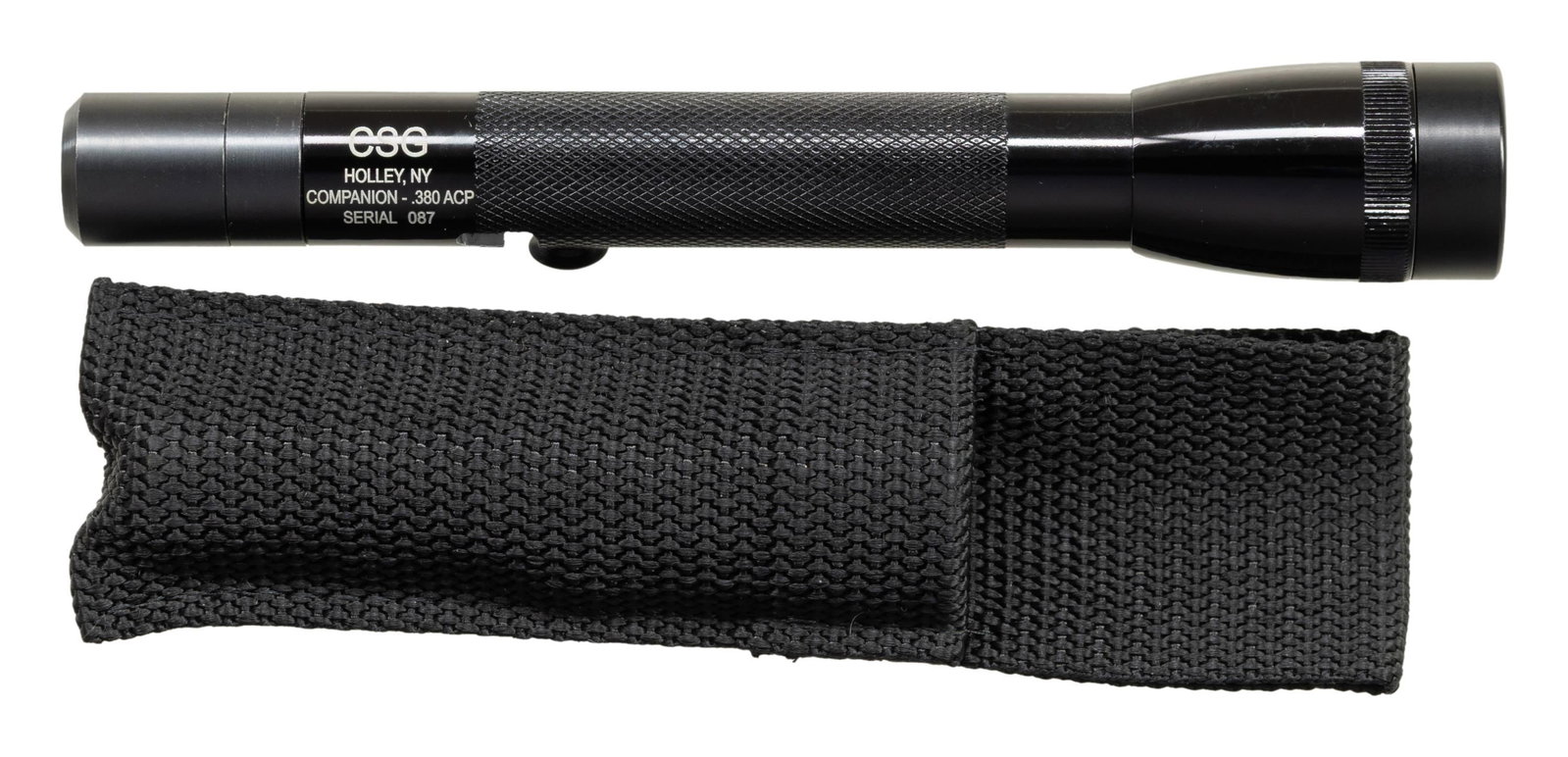 FAUCI CSG COMPANION AOW FLASHLIGHT.: Cal 380 ACP. S# 087. Bbl 1". An interesting concealed 380 within a small 6 1/2 " Maglite style flashlight. UNATTACHED ACCESSORIES: nylon carrying case, wrench & white cardboard box. CONDITION: all asp