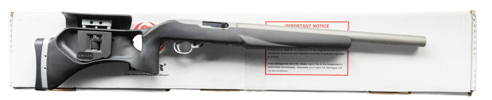 NEW, RUGER 10/22 SEMI-AUTOMATIC RIFLE WITH: INTEGRAL AWC ULTRA II SILENCER & ACCESSORIES. Cal. 22 (22 LR). S# 350-98030 (receiver) 080382 (silencer). Bbl. 17 5/8". 10/22 (Catalog #: K10/22-TS) semi-automatic rifle mfg. by Ruger and subsequently