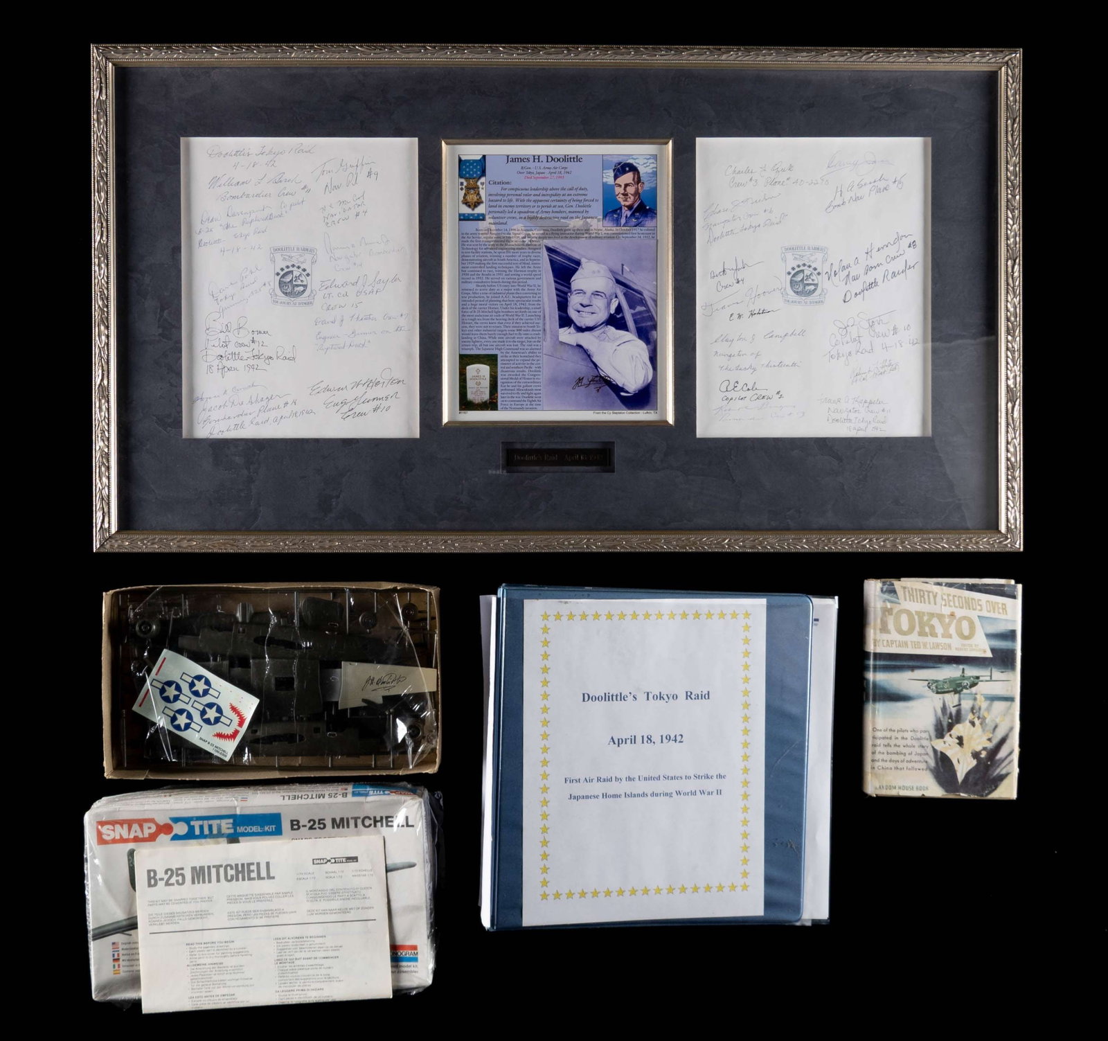 INTERESTING DOOLITTLE RAID GROUPING.: This grouping consists of a number of items that pertain to the Doolittle raid that attacked Japan on their home front. 1) Framed commemorative document for James H Doolittle. It is flanked by two sig