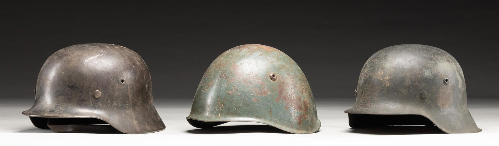 3 WWII AXIS HELMETS. - 2