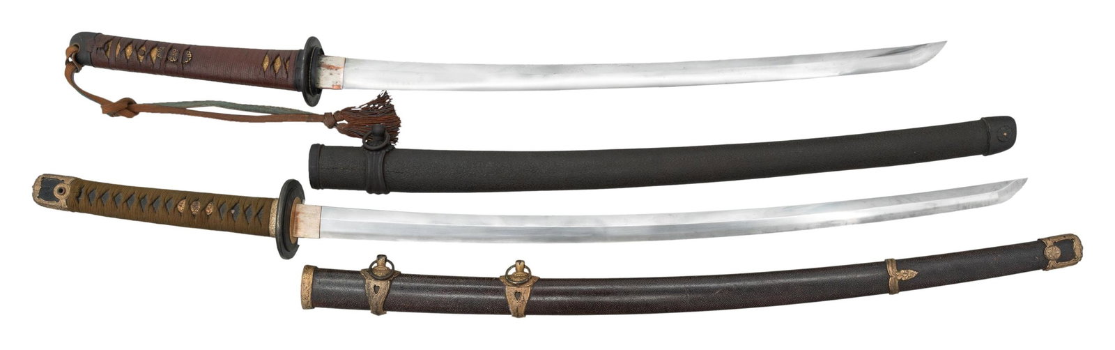 2 JAPANESE SHIN-GUNTO KATANA.: 1) Naval. Overall length is 40 3/4" with a 29" blade having a straight hamon and a silvered copper habaki. Plain iron tsuba with a large rayed seppa above and below along with a small seppa above and 
