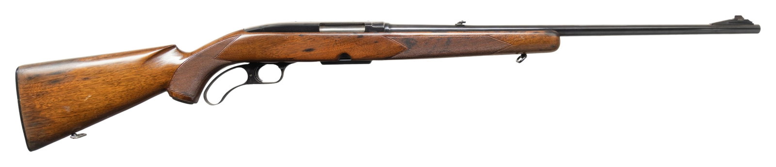 PRE-64 WINCHESTER 88 LEVER ACTION RIFLE.: Cal. 308 Win. S# 20974. Mfg. 1956. Bbl. 22" with ramp mounted bead front sight & flip up rear sight. Hand checkered pistol grip stock with steel pistol grip cap, checkered plastic butt plate, & factor