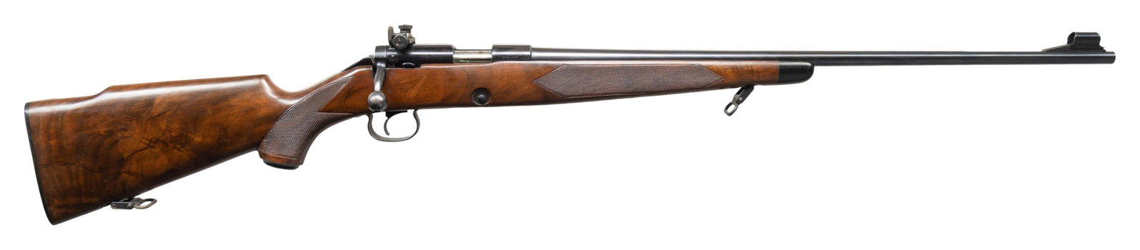 WINCHESTER 52C SPORTER BOLT ACTION RIFLE.: Cal. 22 LR. S# 99144C. Bbl. 24" tapered sporter weight. Ramped bead front sight with hood. Receiver mounted Lyman 48F aperture rear sight. Receiver has four proper holes for scope mounting. 1960 mfr. 