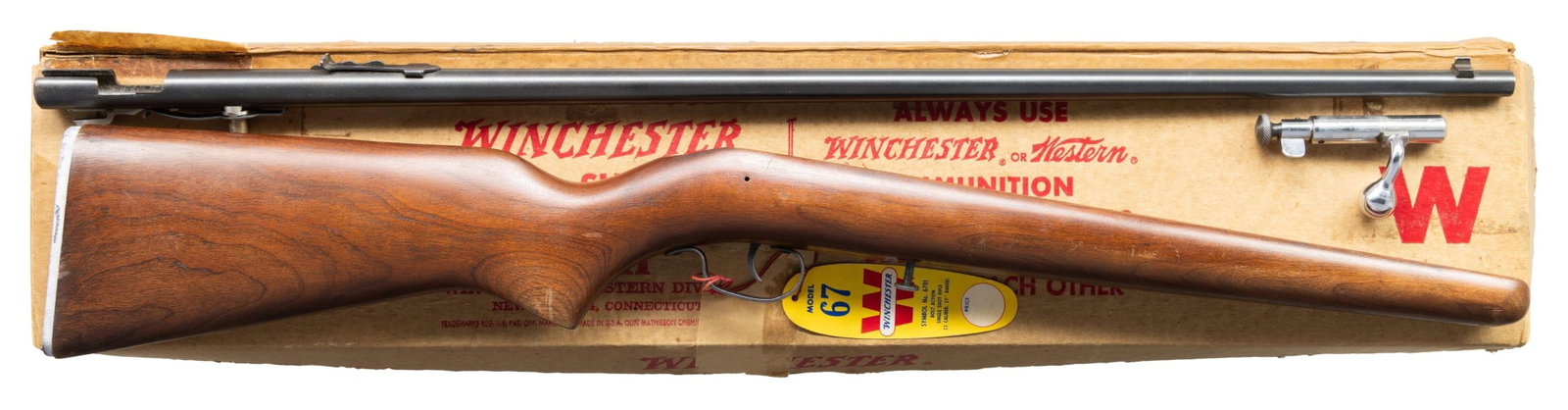WINCHESTER 67A SINGLE SHOT RIFLE WITH HANG TAG.: Cal. 22 S,L,LR. Bbl. 27" with dovetailed bead front sight and ladder adjustable rear sight. Nickel plated bolt. Smooth semi pistol grip walnut stock with checkered black plastic butt plate. UNATTACHED
