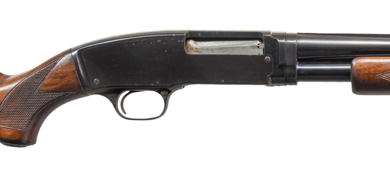 WINCHESTER MODEL 42 PUMP SHOTGUN.: Cal. 410. S# 85290. Plain rib 25.5" bbl. includes Pachmayr Power-Pac choke system; while chamber is marked for 2 1/2", appears to be reamed out to 3". Tubular mag. Deluxe style checkered walnut stock 