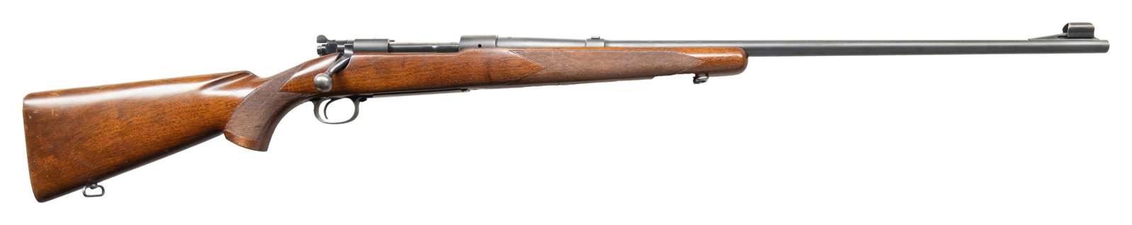 220 SWIFT, WINCHESTER PRE-WAR MODEL 70 BOLT ACTION: RIFLE. Cal. 220 Swift. S# 22901. Mfg. 1939. Tapered 26" barrel w/ ramp mounted hooded bead front sight & filler in rear dovetail. First model action w/ cloverleaf tang, clip guide, wave matting on top