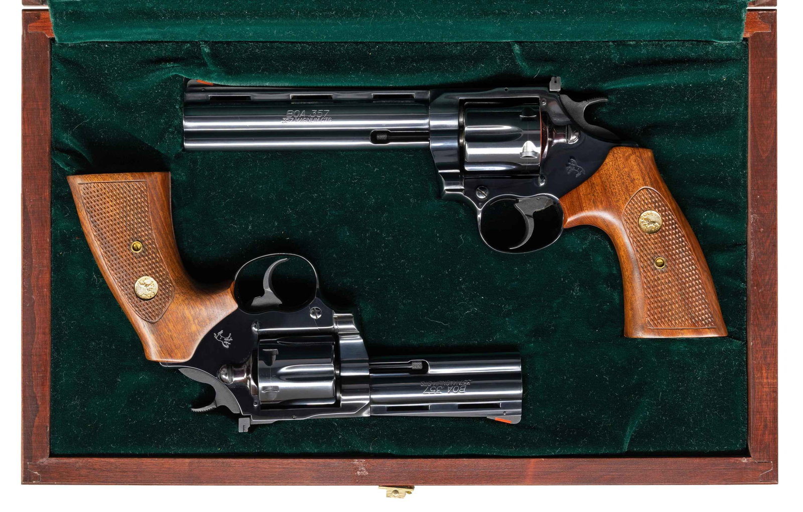 RARE CONSECUTIVE NUMBERED CASED PRESENTATION SET: OF COLT BOA DA REVOLVERS. Cal. 357 Magnum. Manufactured in 1985 as a limited run of 1,200 total revolvers by Lew Horton Distribution. 600 revolvers were produced with 6" barrels and 600 being produced