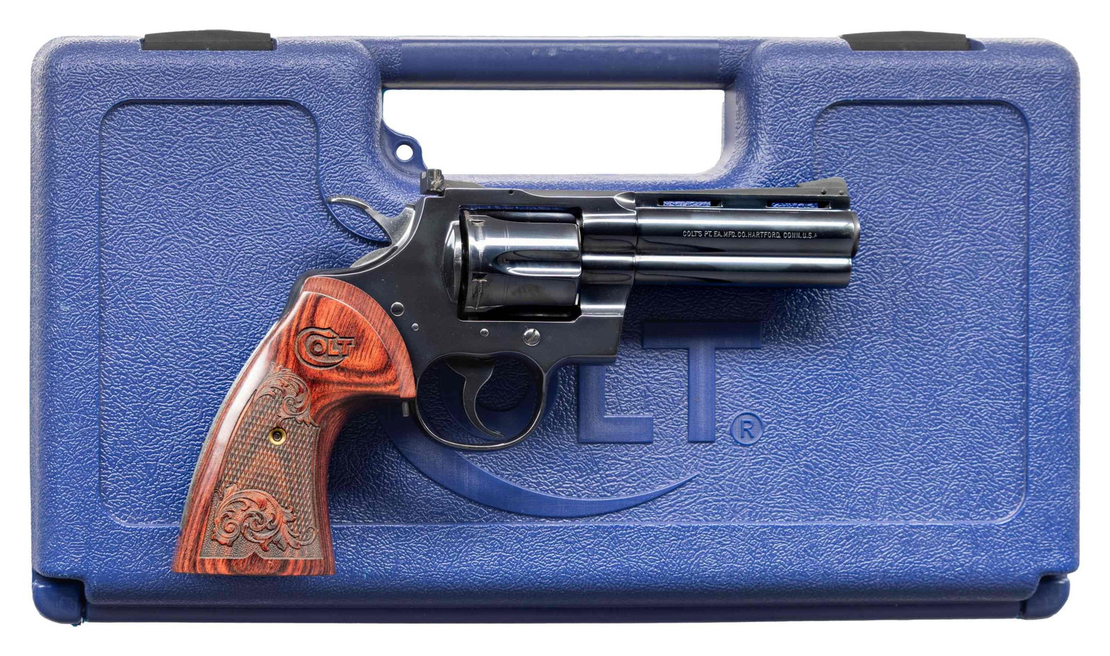 4" COLT PYTHON DOUBLE ACTION REVOLVER.: Cal. 357 Mag. S# V77431. Mfg. 1979 during a year where high demand increased production to 0ver 51,000 in that year. Fitted with a 4" bbl with square notch adjustable rear sight, wide spur hammer and