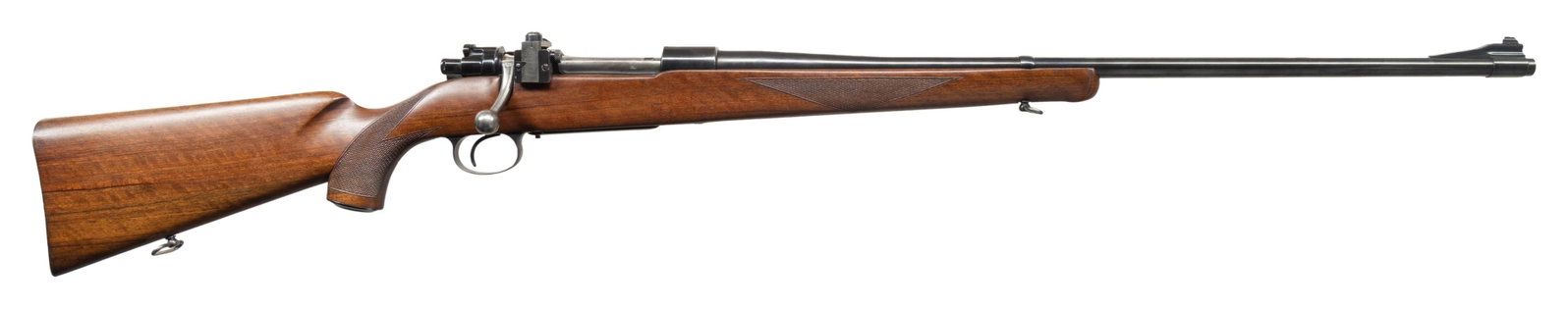 257 ROBERT., PAUL JAEGER CUSTOM FN MAUSER BOLT: ACTION RIFLE. CAL. 257 (257 Roberts). S# 1821. Tapered 24" bbl. w/ barrel band for swivel. Band mounted blade front sight & receiver sight. 1950 Dated FB Mauser action with claw extractor, low swing s