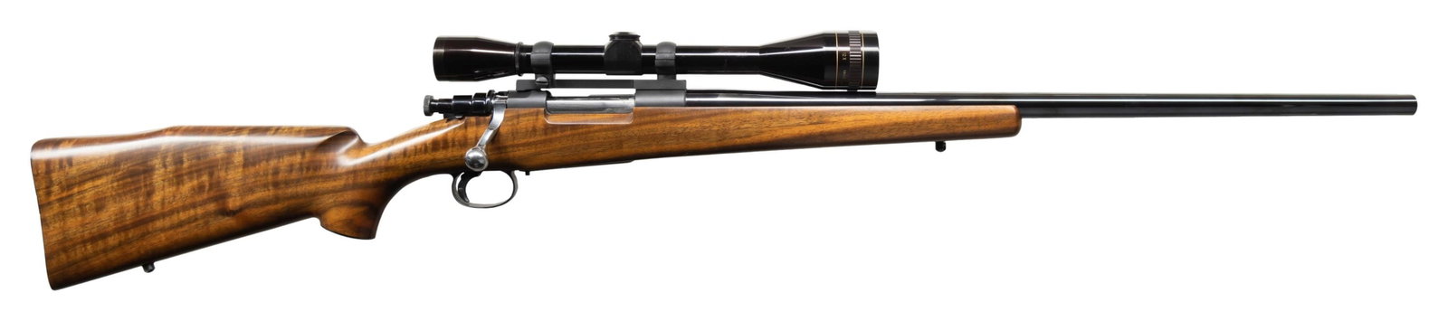 CUSTOM DUANE WEITE 22-250 MAUSER ACTION BOLT: ACTION RIFLE WITH LEUPOLD SCOPE. Cal. 22-250. S# 47423. Gloss finished, free-floating 24" bbl. Pre-1974 Leupold 12x AO tapered crosshair scope (S# 327509) on Redfield rings & base. Military Mauser act
