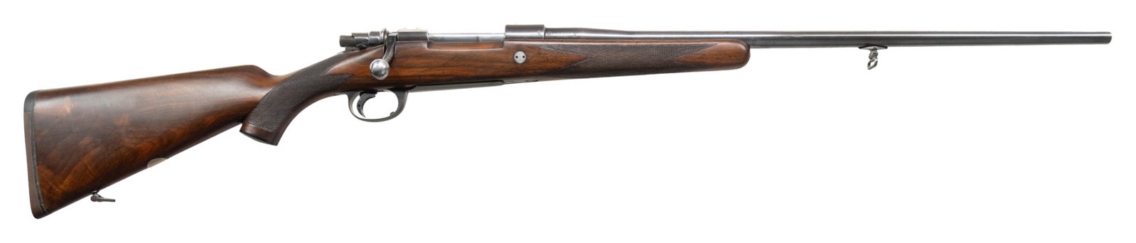 JOHN RIGBY OF PALL MALL, LONDON MAUSER ACTION BOLT: ACTION STALKING RIFLE. Cal. 270 Win. S# 6363. Tapered 24" bbl. w/ 1980 London Nitro proofs on barrel. Mauser military style action w/ thumb recession, opened up clip guide, staggered mag., hinged floo