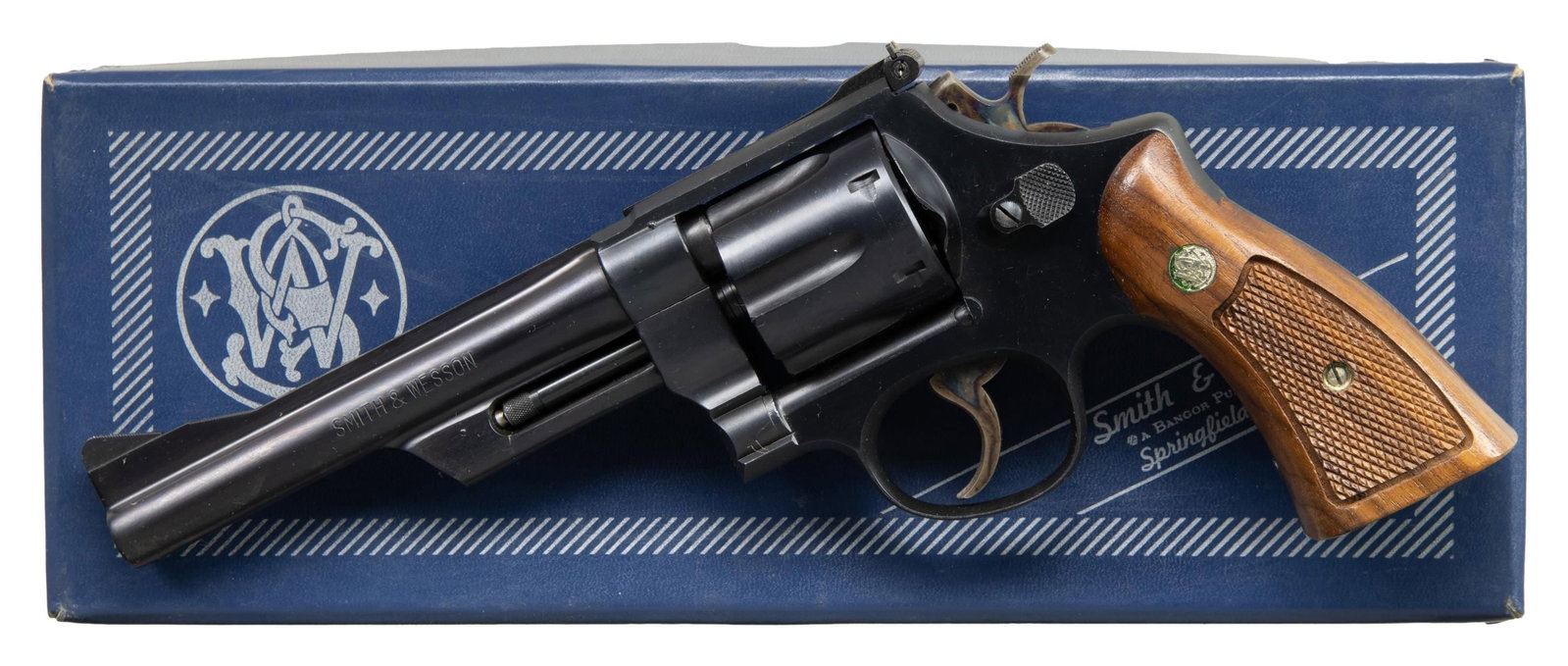 SMITH & WESSON MODEL 28-2 "HIGHWAY PATROLMAN": DOUBLE ACTION REVOLVER. Cal. 357 Magnum. S# N42440. Bbl pinned 6" with non-serrated rib. Serrated ramp front with adjustable micrometer rear sight. Fluted 6 shot cylinder. Satin blue finished 3 screw 