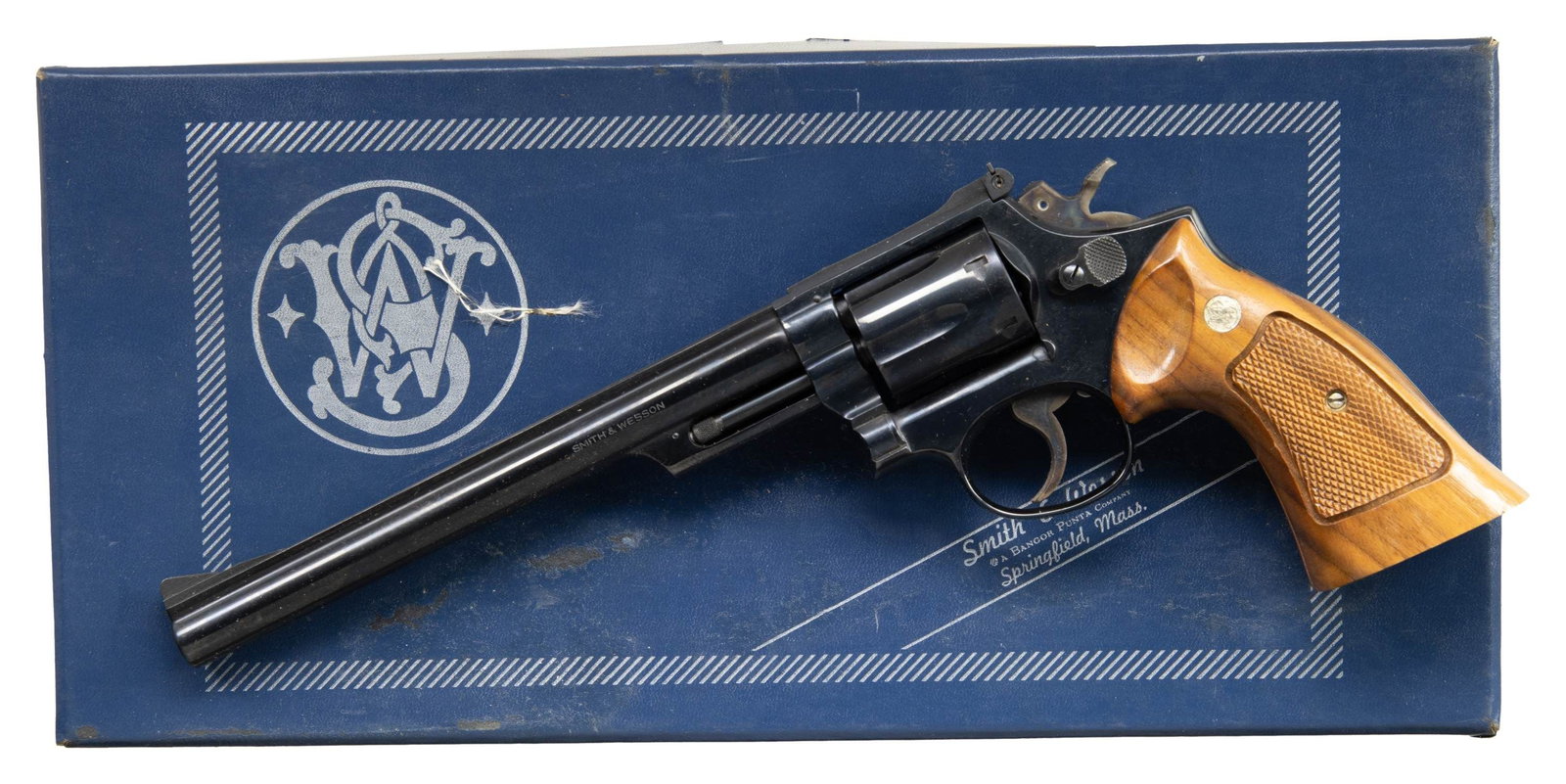 SMITH & WESSON MODEL 53 DOUBLE ACTION REVOLVER.: Cal. 22 Remington Jet/22 Long Rifle. S# 4K83600. Bbl 8 3/8", pinned with rib & shrouded extractor. Serrated ramp front with micrometer rear sight. Fluted 6 shot cylinder accepts steel inserts for 22 L