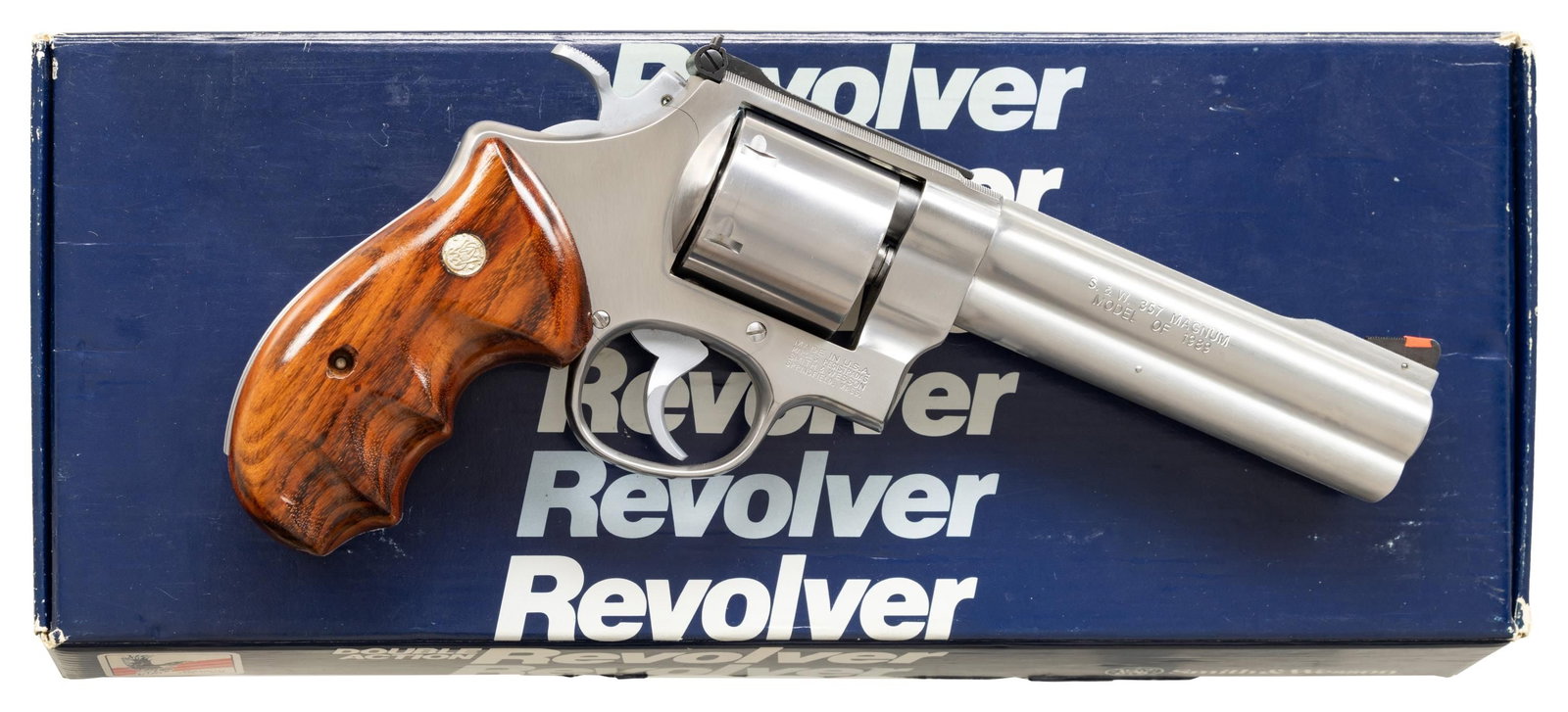 SMITH & WESSON 627-0 CLASSIC HUNTER DA REVOLVER.: Cal. 357 Mag. S# BEK4084. Bbl. 5 1/2" marked "MODEL OF 1989". Ramped serrated blade front sight with orange insert. Adjustable square notch rear sight. 6-shot unfluted cyl. Stainless finish with hard 