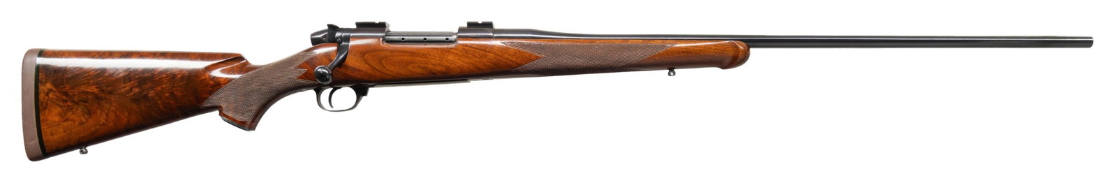 CUSTOM GERMAN WEATHERBY MKV BOLT ACTION RIFLE.: Cal. 257 Wby. S# P30248. Bbl. 26". Receiver has Weaver style scope bases. Bolt handle is matching to receiver. West German made rifle denoted by P prefix. Blued finish. Custom fancy high-grade checker