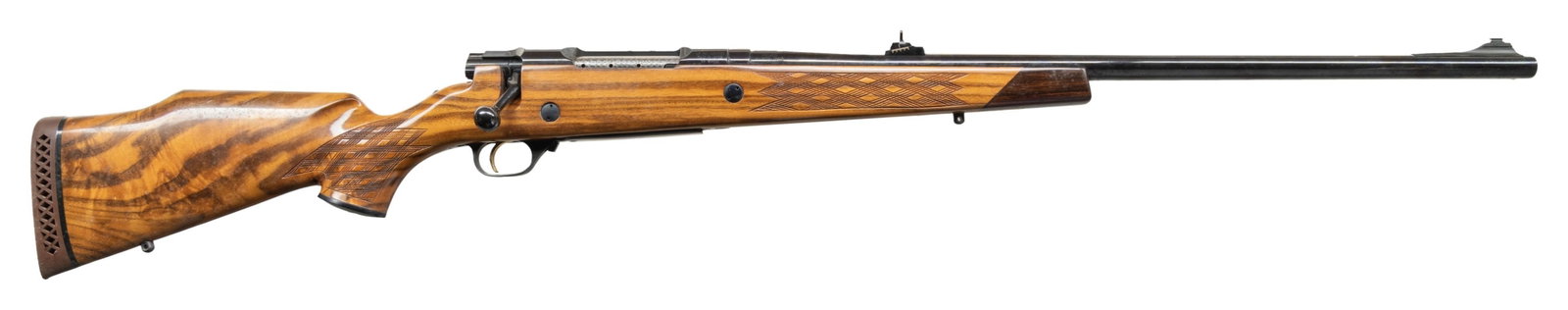 NIKKO 7000 GOLDEN EAGLE BOLT ACTION RIFLE.: Cal. 458 Win. S# N010620. Bbl. 26". Ramped gold bead front sight. Ramped Williams rear sight. Receiver is factory drilled & tapped for scope mounting. Japanese made rifle. Blued finish with gold highl