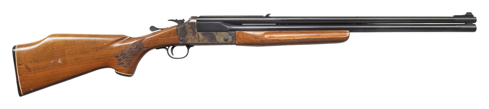 357 MAG. / 20 GA., SAVAGE MODEL 24V SERIES D COMBO: Cal. 357 Mag. / 20 Ga., 2 3/4" & 3". S# D655757. Bbls. 24". Blade front sight, folding rear sight & base for scope. Case colored receiver with barrel selector on hammer. Skip-line checkered walnut sto