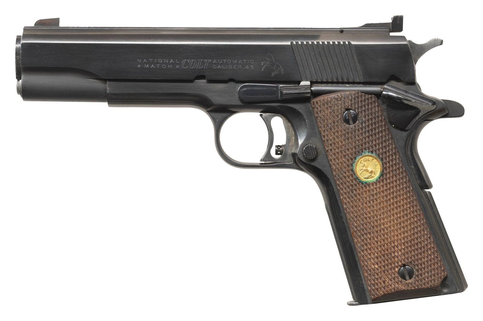 1960 COLT NATIONAL MATCH SEMI AUTO PISTOL: Cal. 45 ACP. S# 7615-NM (1961). National Match 5" barrel. Patridge front sight & adj. rear sight. Beveled barrel bushing & replacement recoil spring plug. Long trigger with adj. stop. Grooved front st