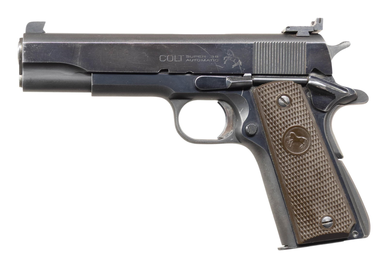 COLT 38 SUPER 2ND MODEL SEMI AUTO PISTOL: Cal. 38 Super. S# 92401. Originally mfg. 1951. Polished blue finish Government model pistol with 5" bbl. & Colt plastic grips. Pistol appears to be tuned for competition shooting with polishing on ham